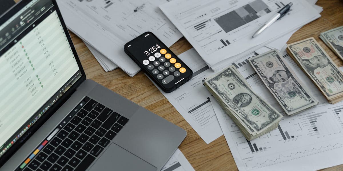 Business owner using a business valuation calculator to estimate company worth